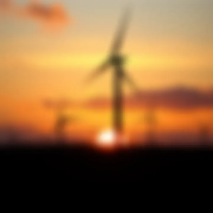 Wind turbine silhouette against a sunset