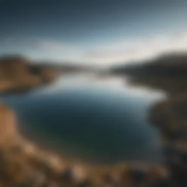 A vast lake viewed from above, highlighting its expansive surface and surrounding landscape.